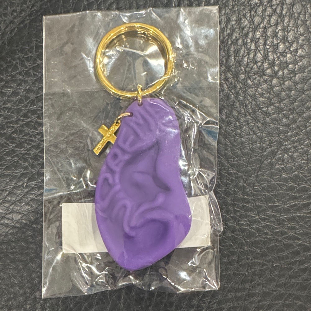 Supreme purple ear with gold earring keychain